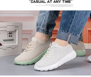 Close-up of breathable knit fabric and adjustable drawstring laces on casual sneakers