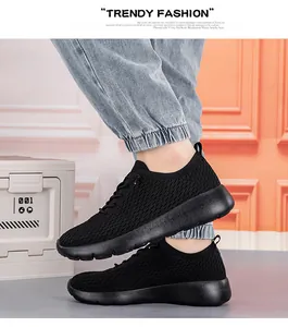 Detail view of black breathable knit sneakers with thick foam sole for casual wear