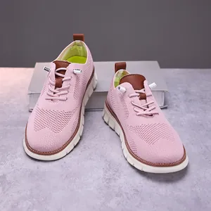Pink breathable flyknit loafers for women with brown leather trim and white platform sole