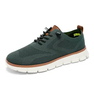 Dark green breathable knit loafers for men with brown trim and thick white rubber soles