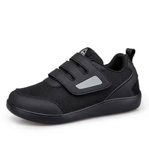Women's black walking shoes with breathable mesh upper and triple velcro straps