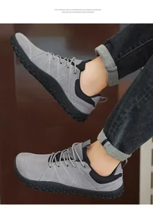 Detail view of grey suede mesh shoes with EVA foam sole and diamond stitching