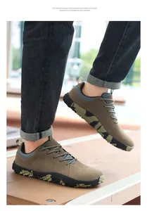 Dettaglio della suola in EVA mimetica leggera su scarpe da trekking marroni da uomo