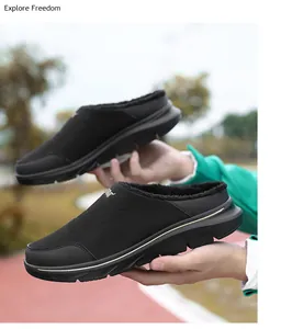 Close-up of black winter outdoor mule with thick warm plush lining and SPORT logo