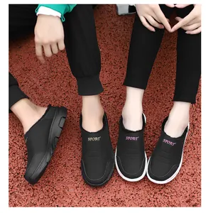 Detail of winter warm slip-on shoes with plush fleece lining and sport letter branding