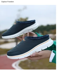 Detailed macro view of deep blue winter slip-on shoes with warm fur lining and SPORT embroidery