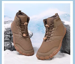 Detail of high-top winter snow boots showing quilted texture and thermal fleece lining