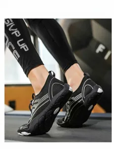 Action shot of breathable barefoot shoes with non-slip soles on a gym treadmill
