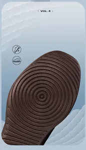 Macro view of non-slip rubber sole with concentric circular grip texture and VOL. 4 text