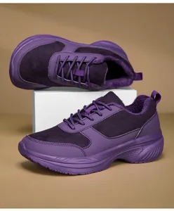 Detail of purple platform sneakers with thick faux fur lining and non-slip sole