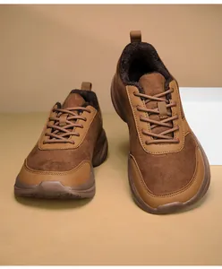 Detail of warm brown winter sneaker with plush lining and durable non-slip rubber sole