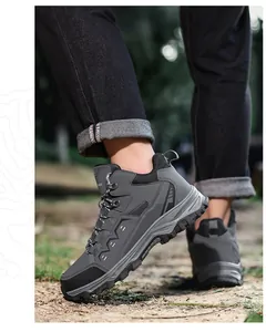Side view of outdoor hiking shoes on natural terrain with non-slip rubber soles