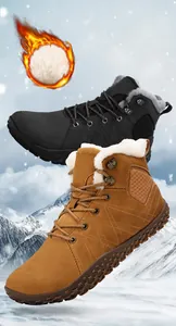 Close-up of non-slip rubber soles and thick fleece lining on winter snow boots