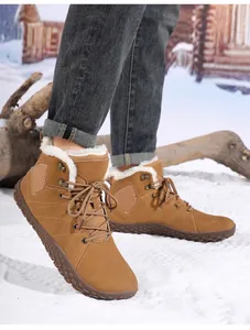 Detailed view of the winter boot featuring warm fleece lining and a non-slip rubber sole