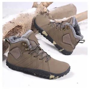 Detail of warm winter snow boots featuring thick gray plush lining and non-slip rubber soles