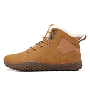 Detail view of winter outdoor boots with thick faux fur lining and non-slip rubber sole