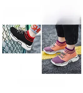 Dettaglio di sneaker in maglia traspirante per bambini con suole antiscivolo e lacci rotondi