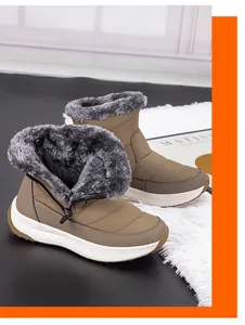Detailansicht khakifarbener Winterstiefel mit dickem grauem Kunstfellfutter und Reißverschluss