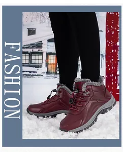 Deep burgundy snow boots with thick faux fur lining and non-slip lug sole detail