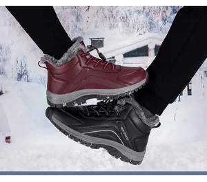 Detail of warm winter snow boots featuring waterproof uppers and thick plush lining in snow