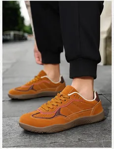 Side view of ginger suede outdoor hiking shoes with stylish colorful streamliner accents