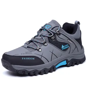 Men's outdoor hiking shoes in grey and black featuring blue accents and non-slip sole