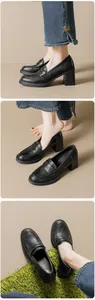 Detailansicht der schwarzen Leder-Loafers mit Blockabsatz und klassischer runder Kappe