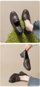 Close-up detail of dark brown platform loafers with thick block heels and round toe