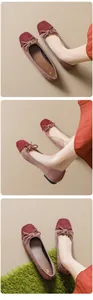 Detail of ballet flats with bow, showing square toe and two-tone suede material