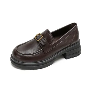 Classic dark brown platform loafers for women with leather finish and gold buckle detail