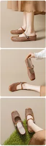 Detail of brown woven Mary Jane slippers featuring retro square toe and metal buckle