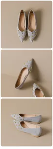 Close-up of grey pointed-toe flat shoes with decorative gold star and snowflake metal studs