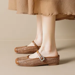 Brown woven Mary Jane mule shoes with platform sole and adjustable strap for women