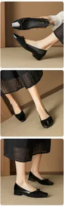 Detail of square toe flat shoes with black patent leather and suede bow accents