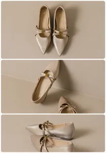 Detailansicht der Satin-Mary-Jane-Ballerinas mit Kreuzgurten und goldener Blumenschnalle