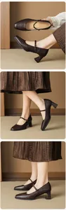 Detail of vintage square-toe Mary Jane heels in dark brown with textured matte finish