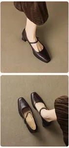 Close-up of the vintage dark brown leather Mary Jane shoes with square toe and block heels
