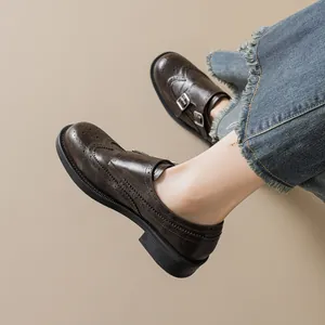 Classic dark brown Brogue loafers with wingtip carvings and double monk straps