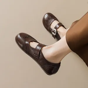 Classic French Brogue Mary Jane shoes in brown leather with decorative cutout details