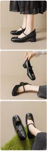 Detail of black Mary Jane shoe featuring vintage gold rose buckle and steady block heel
