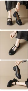 Detailed macro view of Brogue perforations and T-strap metal buckle on platform Mary Janes