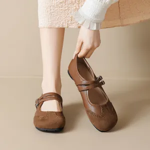 French vintage brown leather Mary Jane flat shoes with dual buckled straps and round toe
