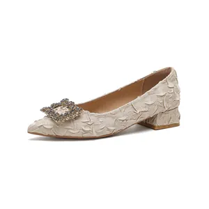 Beige pointed toe pumps with pleated fabric and sparkling crystal buckle block heel