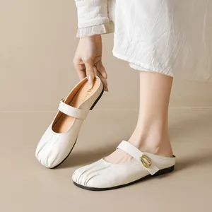 French pointed toe mule shoes with pleated ivory leather and gold buckle accents
