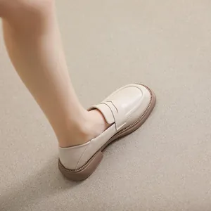Classic beige platform loafers for women with a vintage retro British style chunky sole