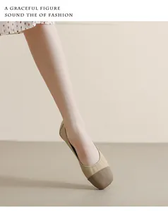 Side view of elegant square toe ballet flats in beige with contrasting dark brown cap toe