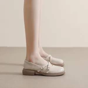 Chic cream platform Mary Jane shoes with vintage straps and thick rubber soles