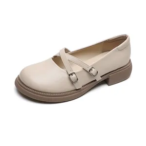 Retro cream platform Mary Jane shoes with crisscross straps and matte leather finish