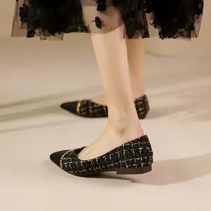 Elegant black tweed pointed-toe flat shoes with gold chain detail and shimmering finish