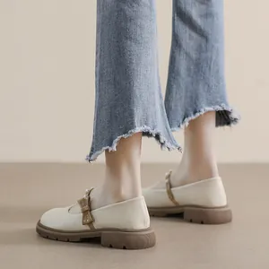French style platform Mary Jane shoes with cream leather, bow accent and pearl detail